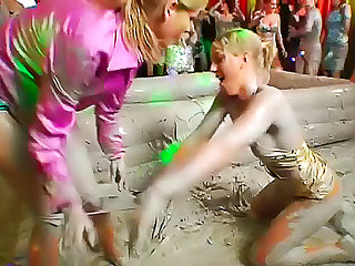 Slick mud on wrestling girls